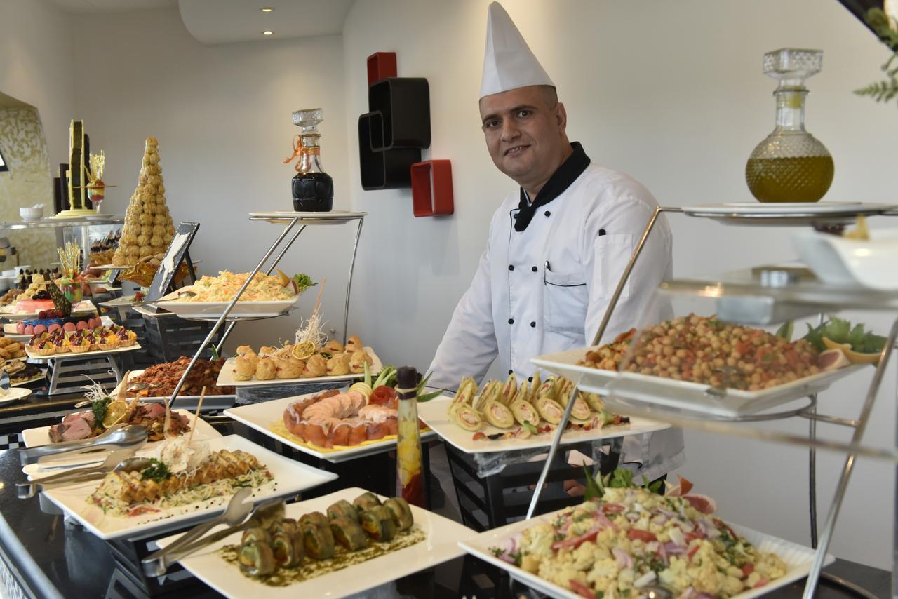 Awaliv International Hotel Ta'if Exterior foto A buffet at a hotel